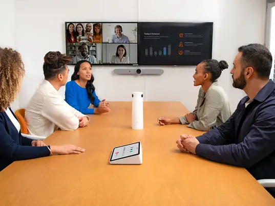 Logitech Sight sitting on a desk during an office meeting